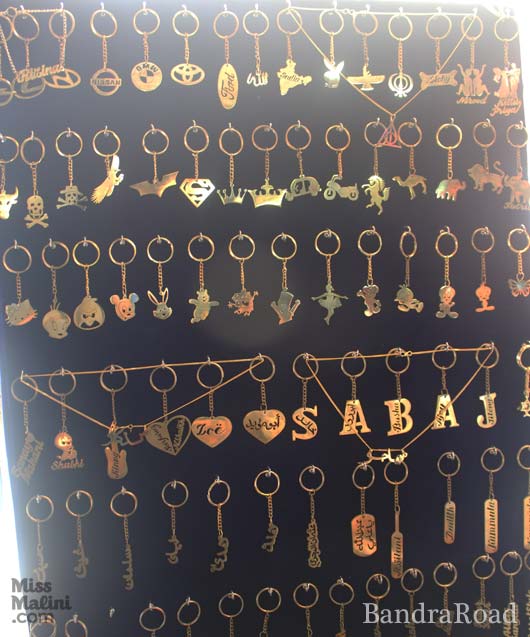 Get a personalized key chain made out of wood and polished with metallic gold.