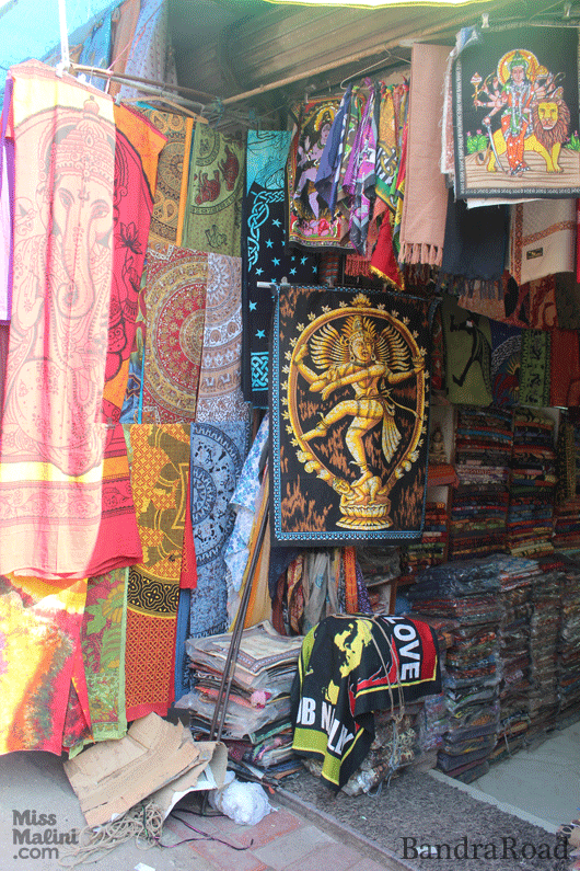 Colourful Indian bedspreads and cushion covers