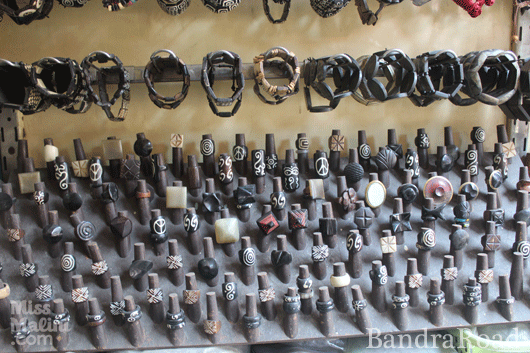 Carved wooden rings on display