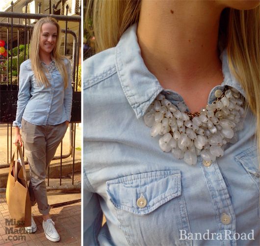 We spotted cutie, Andrea Brown, working a relaxed denim shirt dolled up with a pretty neck piece and white sneakers.