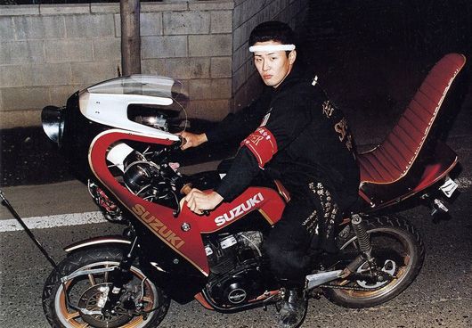 A Bosozoku rider on a modified motorbike