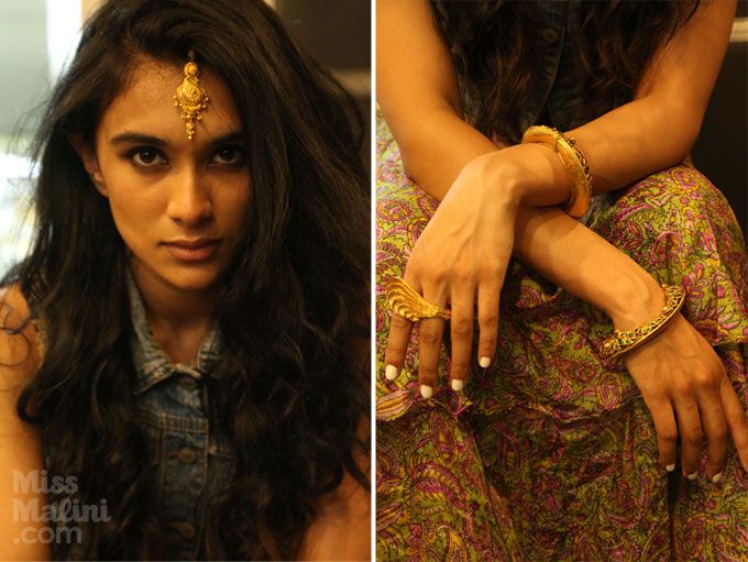 Waist coat and warp skirt with a maang tikka, doube ring and bracelets by Gehna, all in 22k gold.