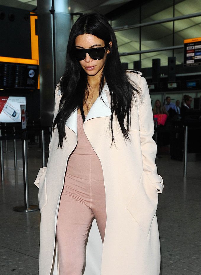 Woah! Kim Kardashian Shows Off Her Pregnancy Bulge In A Unitard!