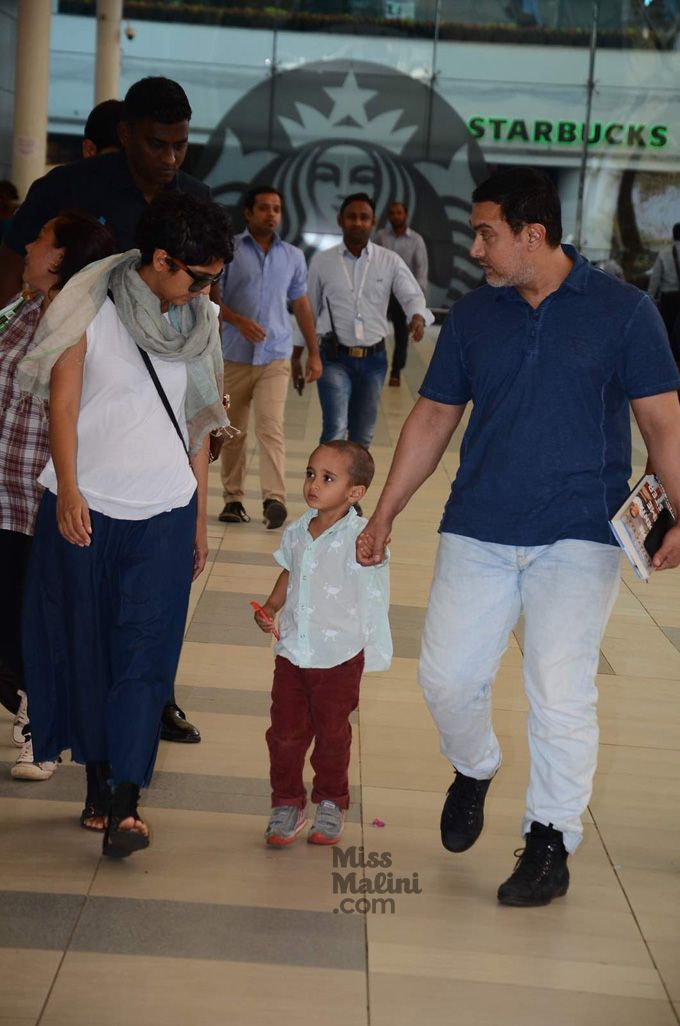 Airport Spotting: How Cute! Aamir Khan & Kiran Rao Return To Mumbai With Azad Rao Khan