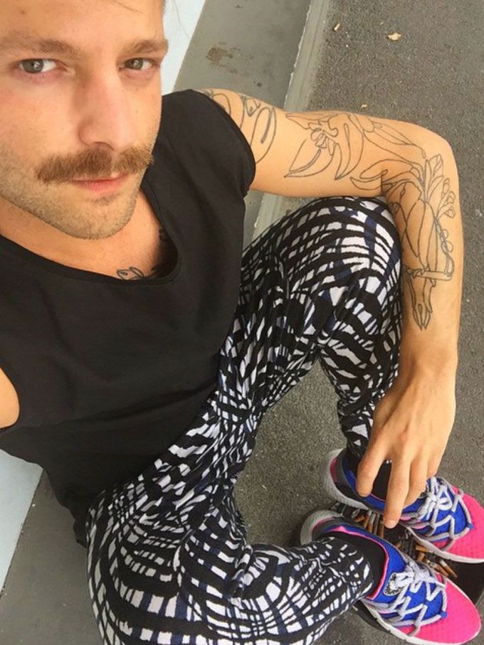 We spotted Riccardo, a fashion professional in a cool pair of printed monochromatic pants and coloured kicks! (Pic: @riccardopolidoro on Instagram)
