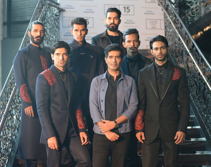 Designer Manish Malhotra with models at the preview of his collection 'The Gentlemen's Club' at Lakme Fashion Week winter/festive 2015