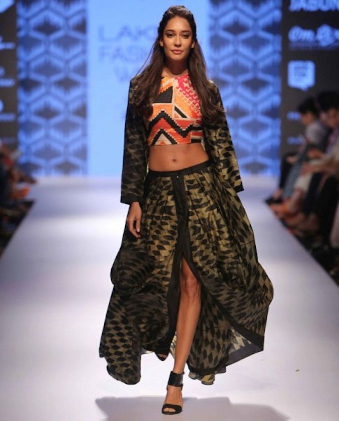 Lisa Haydon for Swati Vijaivargie LFW AW15 Off The Runway on Exclusively.com (Black and Gold circualr skirt, jacket and printed bandeau)