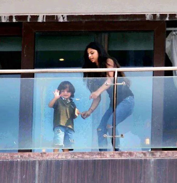 Aww! Check Out These Photos Of Suhana Khan Looking After AbRam Khan As He Waves To The Media