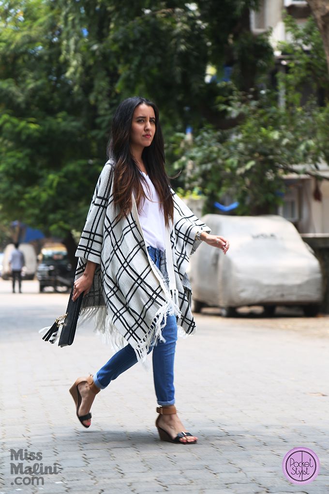 Pocket Stylist wearing cape from Koovs, clutch from The SG Collection