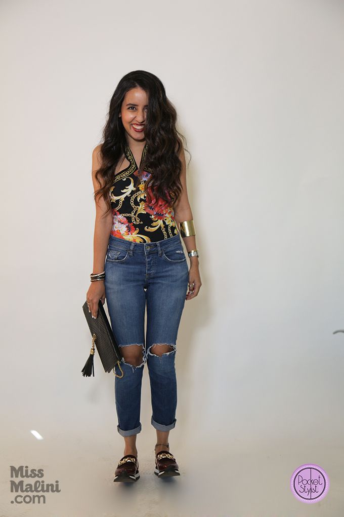 Pocket Stylist in jeans from Topshop, swimsuit from Gottex and clutch from The SG Collection