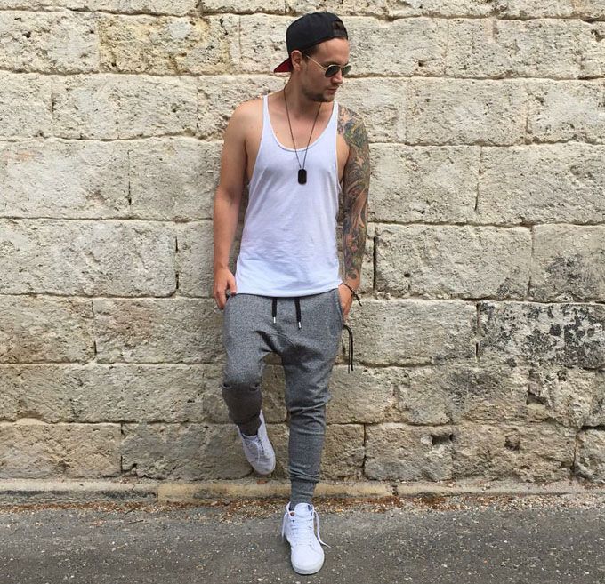 Base ball hat worn back, tank top and grey joggers with sneakers #GymStyle