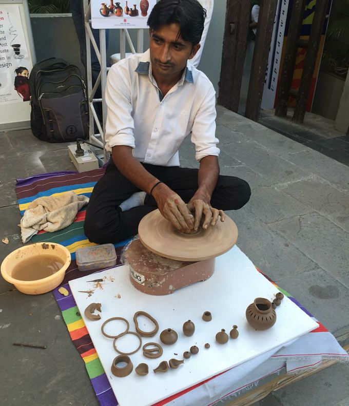 Local artisans making pots at #TheIndiaStory