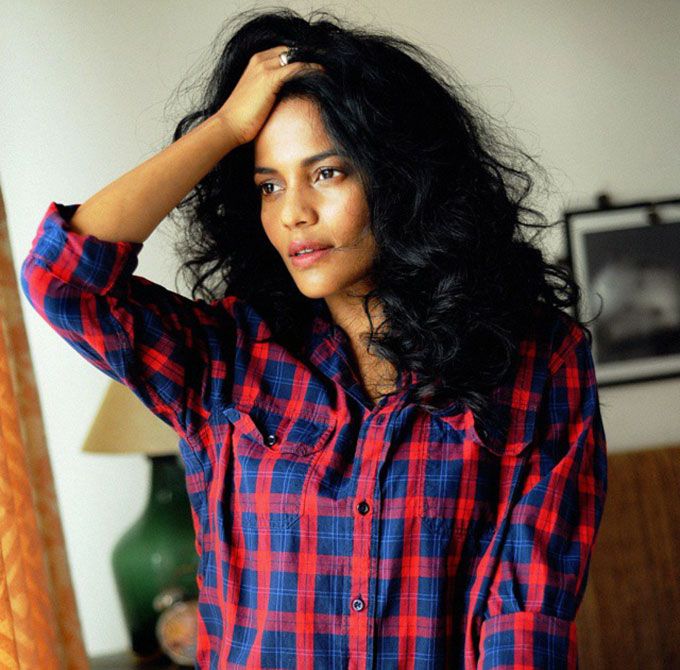 Keeping it casual in a classic plaid shirt. (source: @priyankabose20 on Instagram)