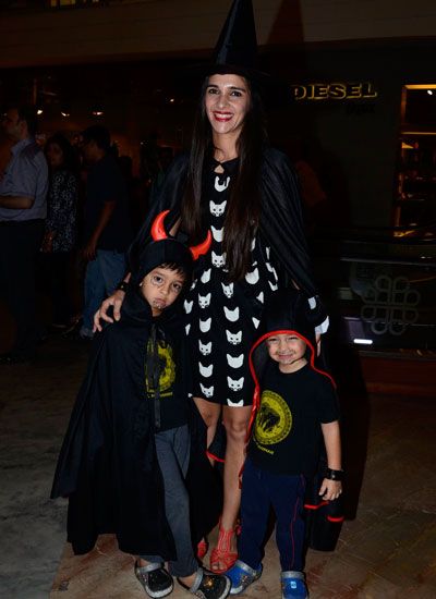 Tara Sharma with her kids at a Halloween party
