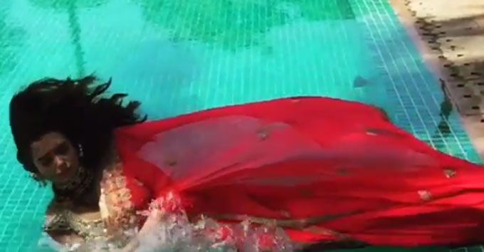 Slo-Mo Video: Amy Jackson Falls Into A Pool In Her Sari!