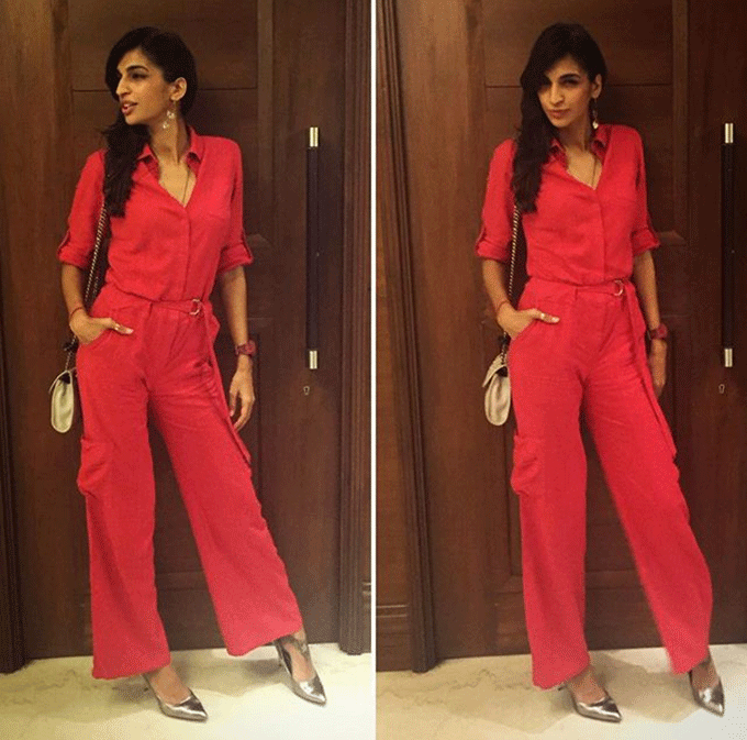 Lady in a beautiful red Jumpsuit. Pic: Anushka Manchanda Instagram.