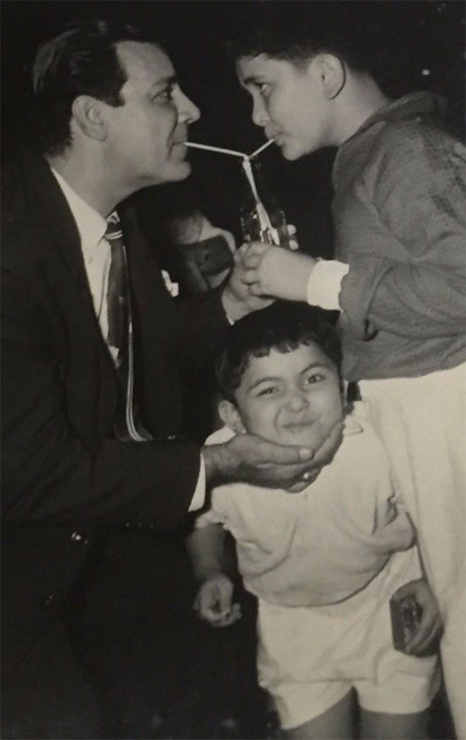 "Always made faces at the camera. Thank you whosoever sent this. Agha uncle,Daboo and me at some of our home party!"