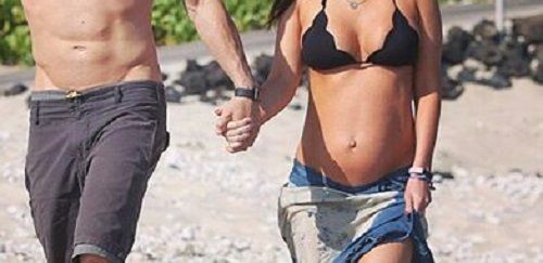 Actress Flaunts Her Baby Bump On The Beach With Her Hubby