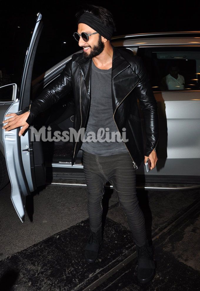 Ranveer Singh wears a black leather jacket and cool sunglasses
