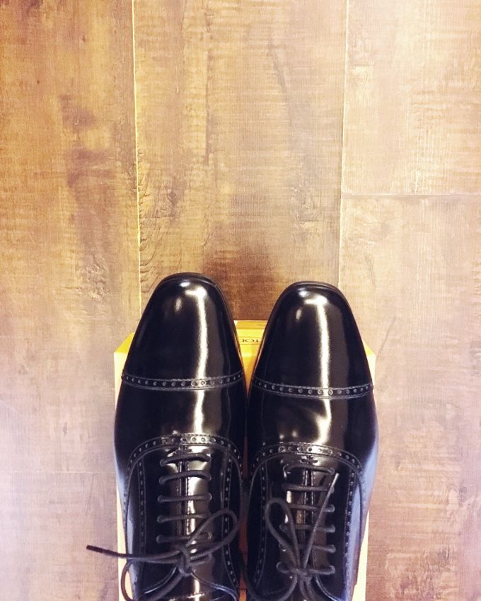 Tod’s cap-toe patent brogues