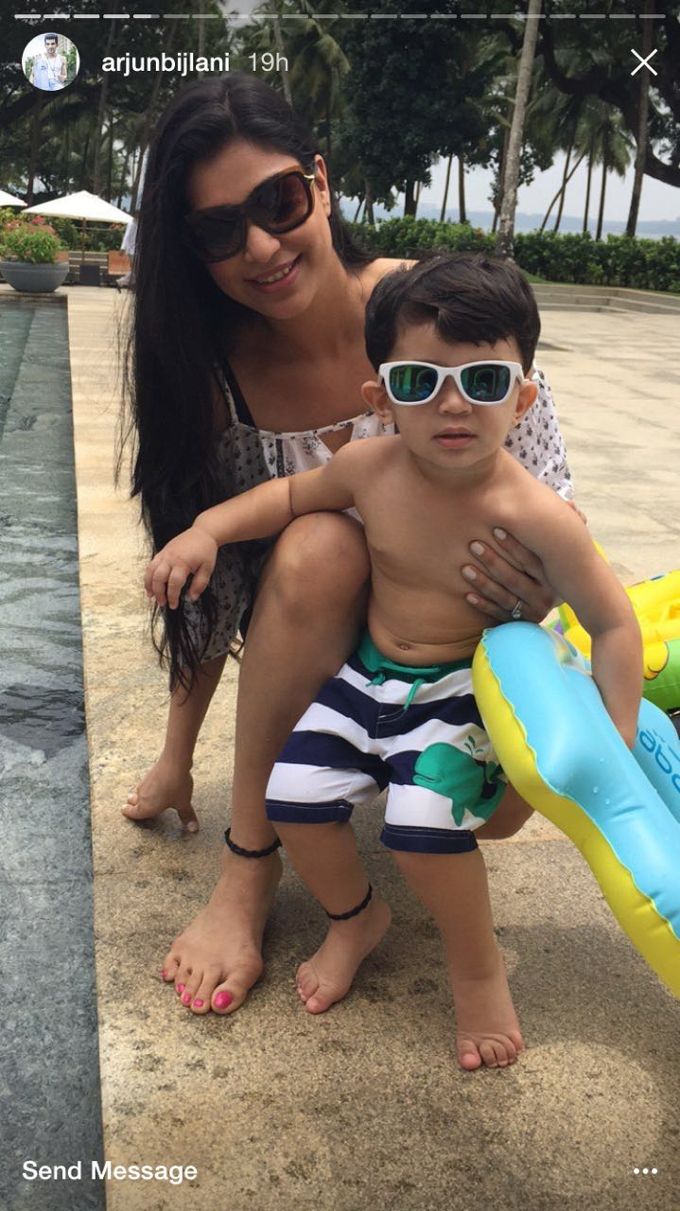 Arjun's wife Neha Swami with their son Ayaan | Source: Instagram