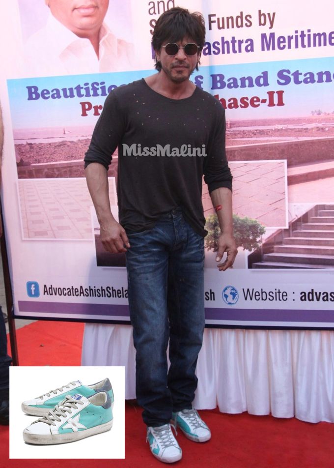 Shah Rukh in Amiri ‘Shotgun’ T-shirt and Golden Goose Deluxe Brand turquoise-white ‘Super Star’ sneakers at the groundbreaking ceremony of Bandra Bandstand beautification project (Photo courtesy | Viral Bhayani)