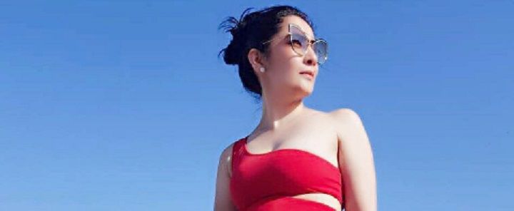 Maanyata Dutt Is Rocking A Red Swimsuit While Chilling By The Pool