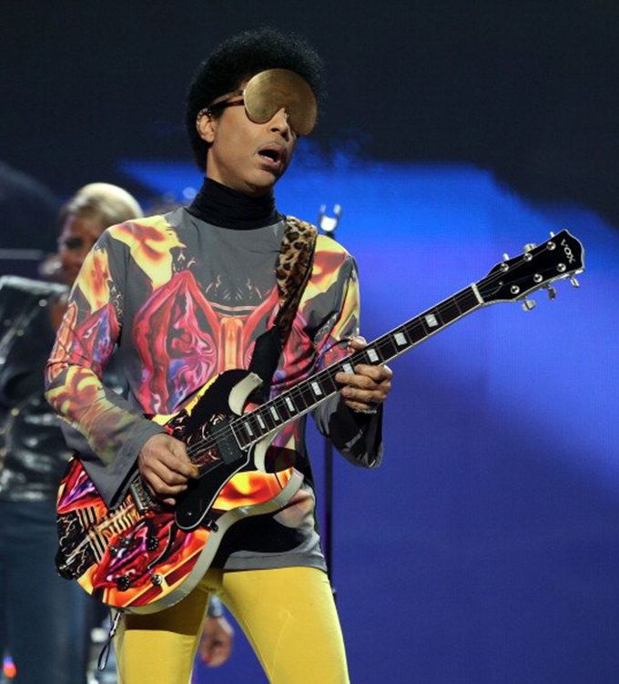 Prince in one of his killer statement sunglasses made out of pure gold. Pic: noisey.vice.blogspot.com