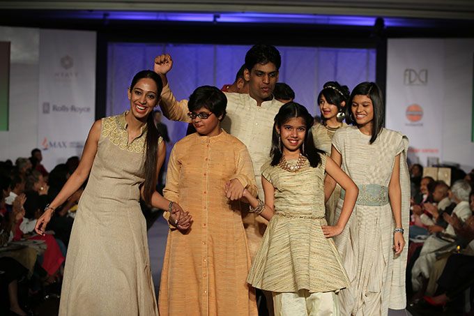 Pearl Academy’s Ridhi Arora along with differently-abled children of the NGO Tamana at the Khadi Fashion Show ‘Inclusion Beyond Boundaries’, a fashion extravaganza that attempts inclusion of the differently-abled into the world of fashion in New Delhi