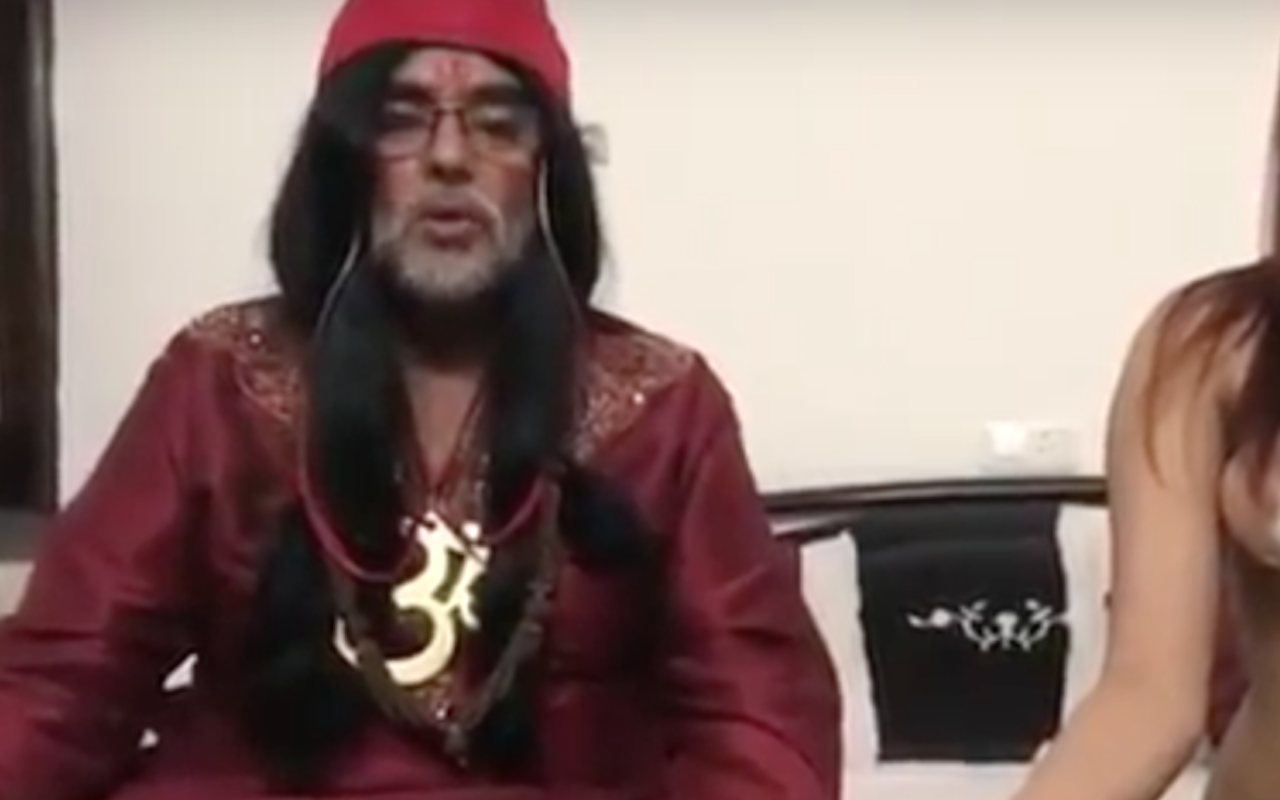 Umm… This Video Of Om Swami Teaching A Topless Girl Yoga Is Going Viral