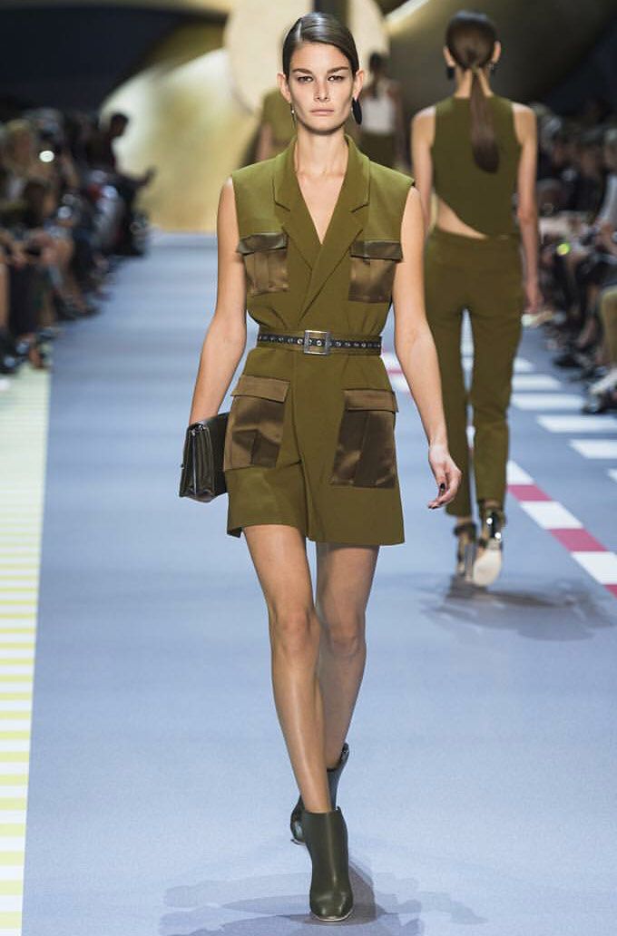 Military green jumpsuit with uniform details at Theirry Mugler (Source: @muglerofficial on Instagram)