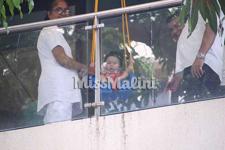 In Photos: Taimur Ali Khan Is Looking Adorable While Swinging In His Balcony