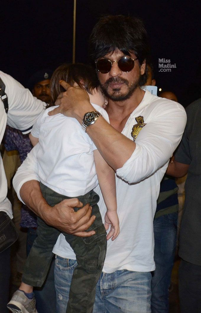 Airport Spotting: Shah Rukh Khan Carries A Sleeping AbRam