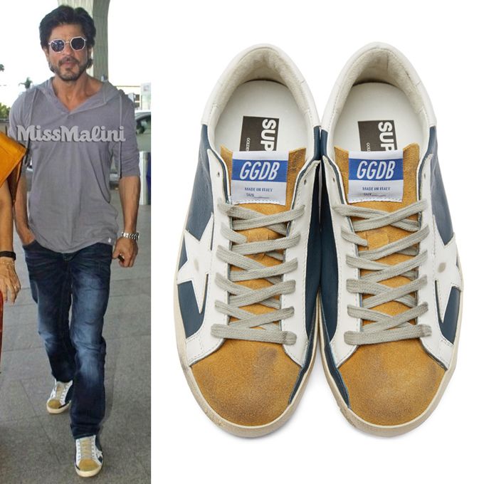Golden Goose Deluxe Brand Super Star sneakers in navy and yellow (Photo courtesy | SSense)