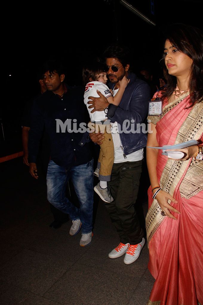 Photos: Shah Rukh Khan Carries AbRam At The Airport