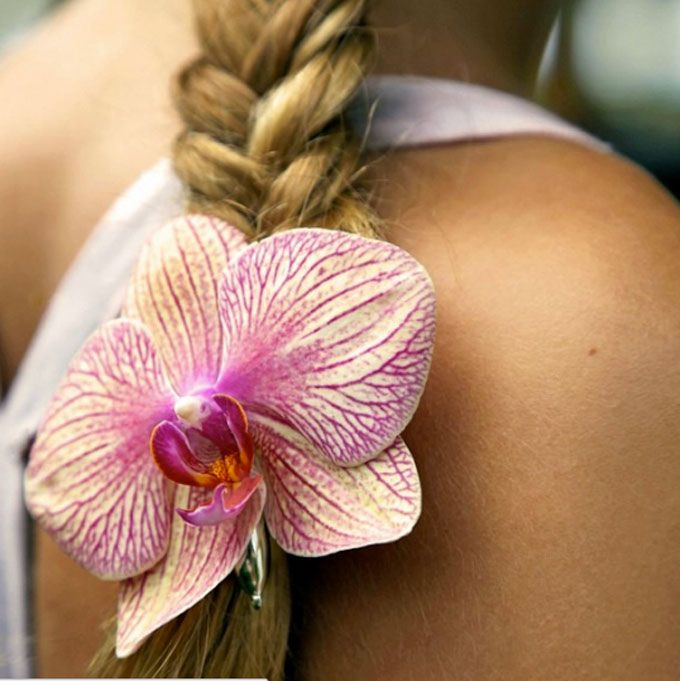 9 Stunning Ways To Wear Flowers In Your Hair