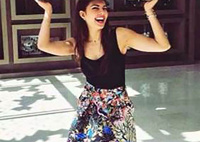 Jacqueline Fernandez Wears The Biggest Hat With The Cutest Skirt!