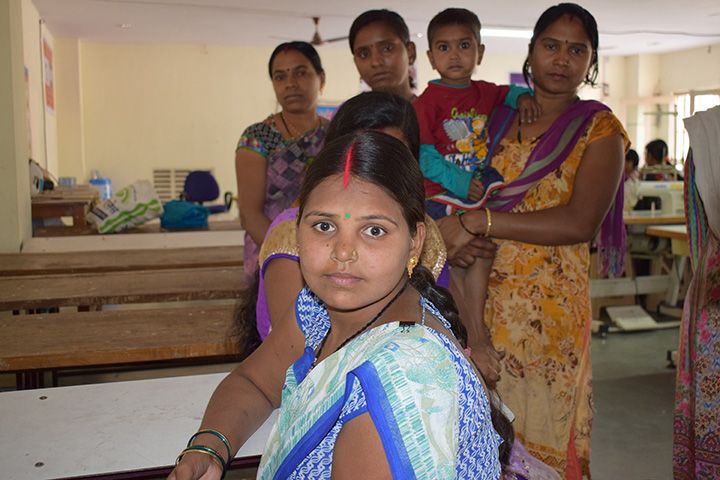Urmila with other women in her sewing class (Photo: Romeo Gates)