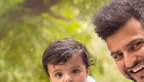 Aww! Suresh Raina Strikes A Cute Pose With His Baby Girl