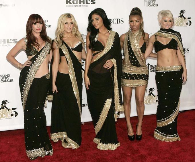 Pussycat Dolls draped in various version of the sari by Rocky Star