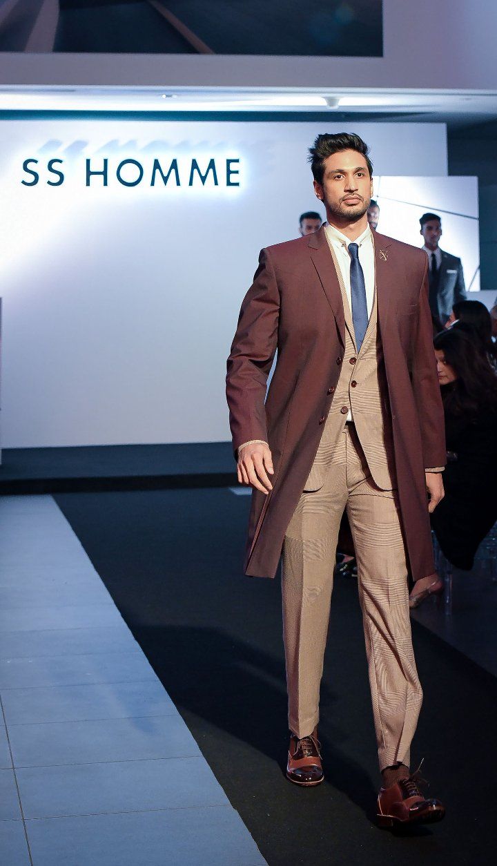 Arjun Kanungo walking the ramp at the SS HOMME Bespoke collection showcase at Porsche Mumbai centre