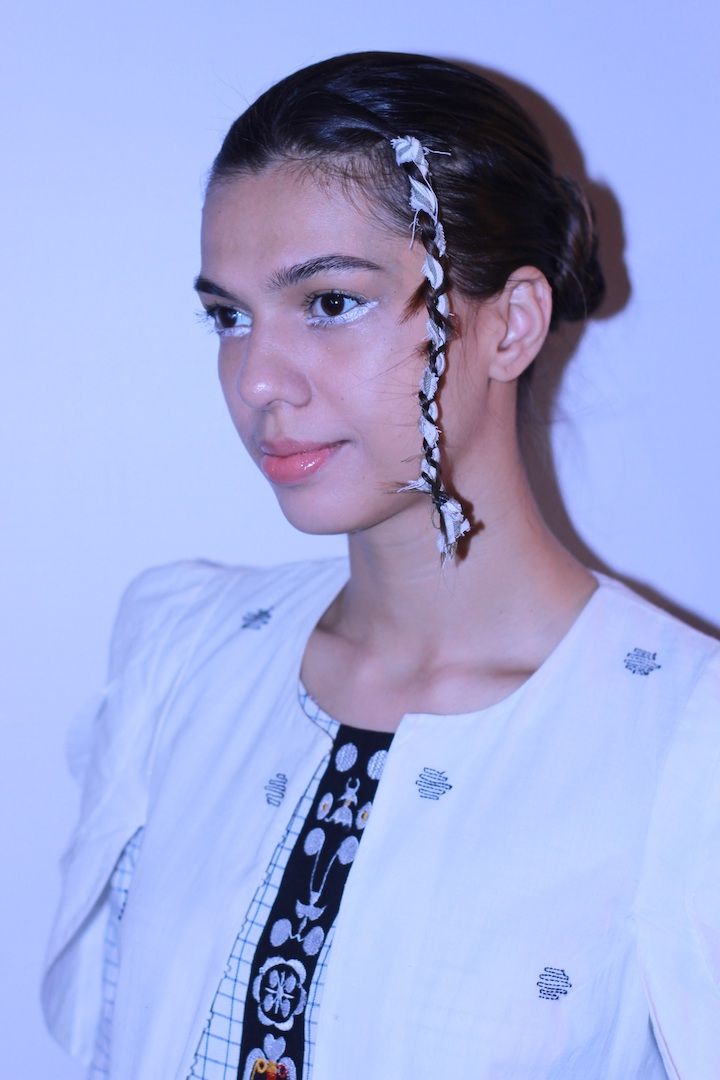 Coloured liner and tribal braids for NorthEastMojo at Lakme Fashion Week SR18