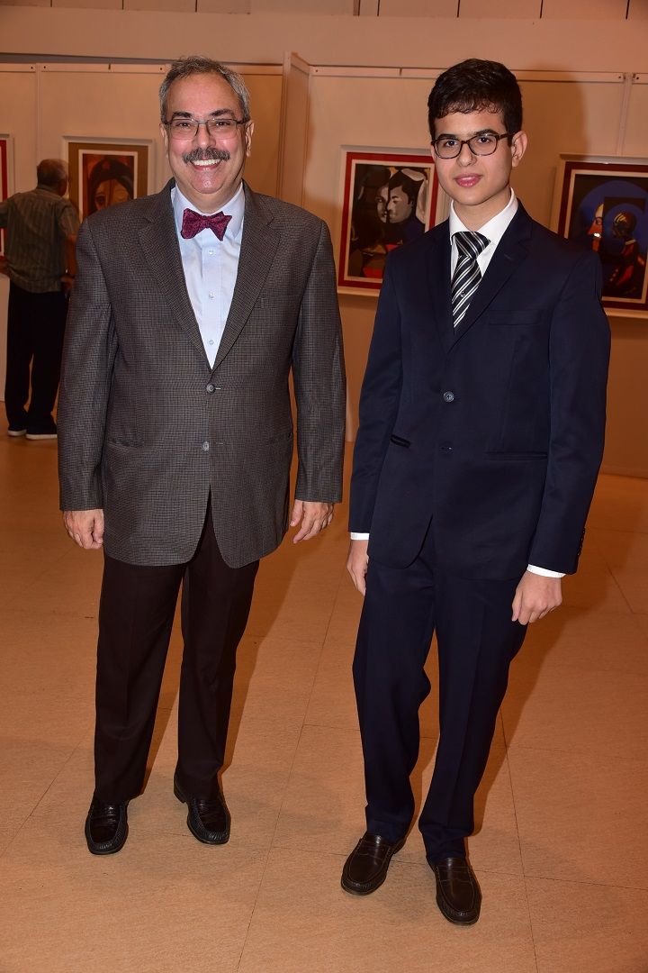 Owner of Jehangir Art Gallery, Adi Jehangir with his son