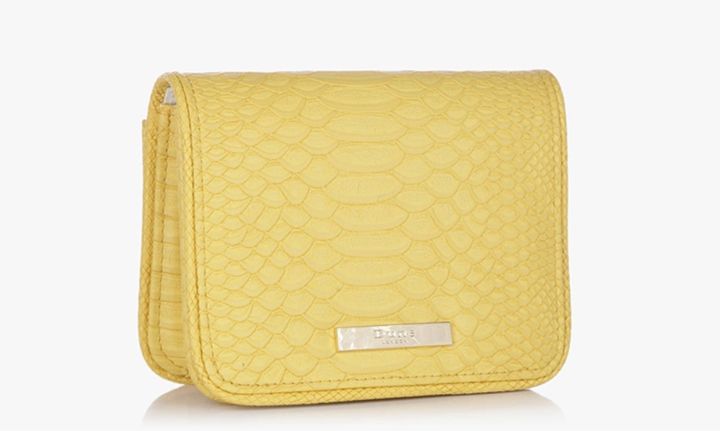 Dune Becky Yellow Clutch | Image Source: www.jabong.com