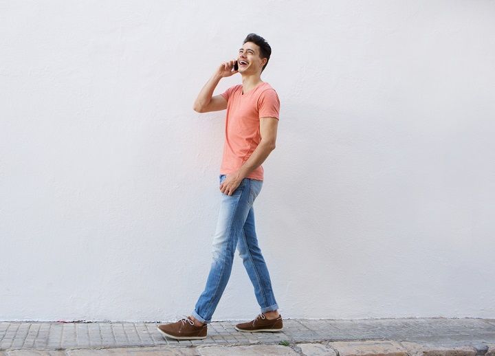 Walking While On The Phone (Image Courtesy: Shutterstock)