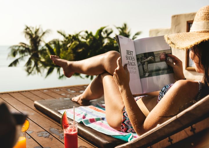 Woman reading a beauty magazine (Image Courtesy: Shutterstock)