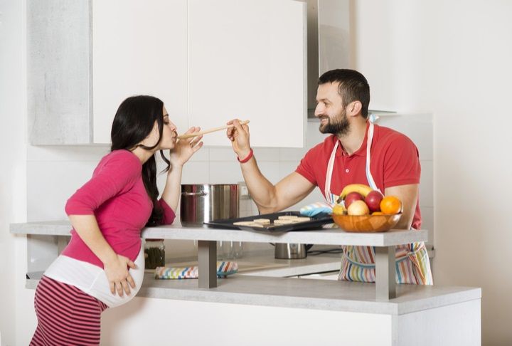 Husband Cooking For Pregnant Wife (Courtesy: Shutterstock)