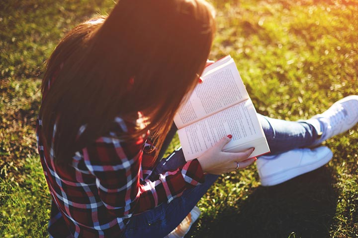 Girl Reading A Book (Image Courtesy: Shutterstock)