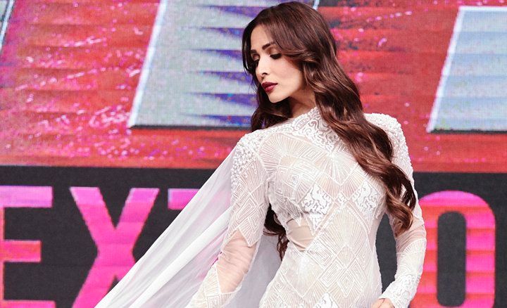 Malaika Arora Wears A White Gown Fit For A Modern Day Bride