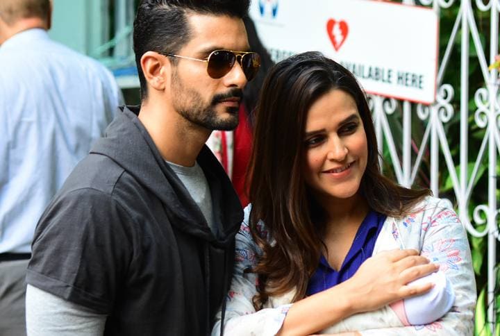 PHOTOS: Neha Dhupia & Angad Bedi Leave The Hospital With Baby Mehr